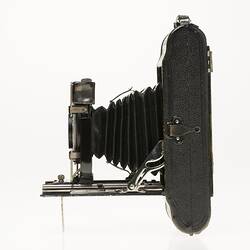 Left profile of fold out black camera.