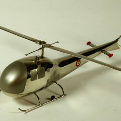 Chrome plated helicopter model. Angle view.