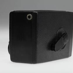 Back view of black plastic movie camera.