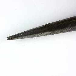 Detail of tip of metal fid showing indents.