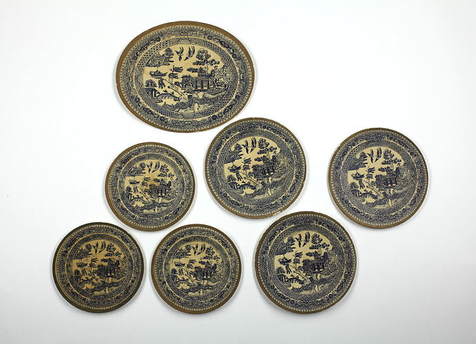 Seven  patterned paper plates.