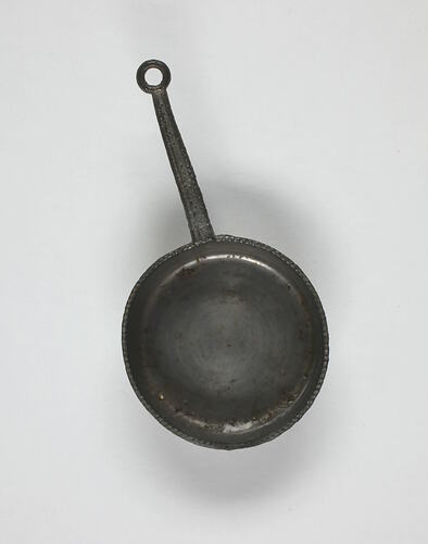 Toy frying pan.