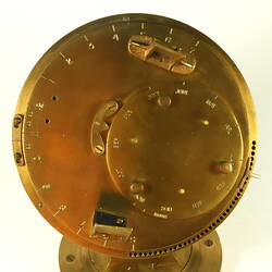 Gold metal chronometer, detail of face.