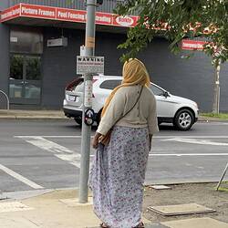 Digital Photograph - Woman Beside 'Checkpoint Barkly' Sign, Cnr Barkly Street and Summerhill Road, Footscray, 5 Jul 2020