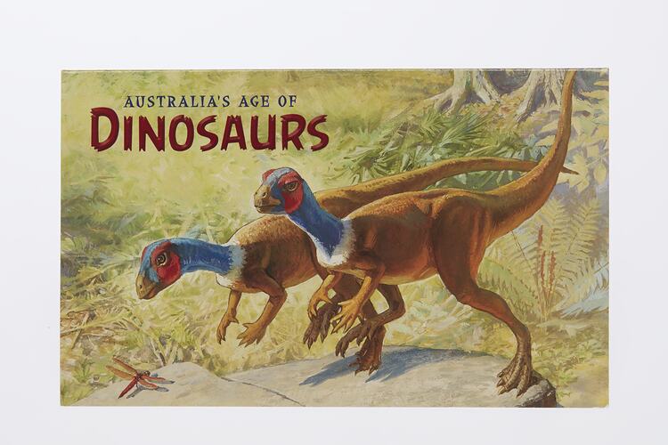 Cover with two brown dinosaurs in rainforest colour illustration. They have blue and red heads and necks.