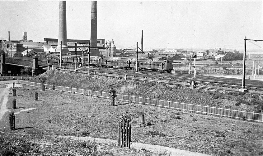 Train passing Richmond Power station, South Yarra, 1923.