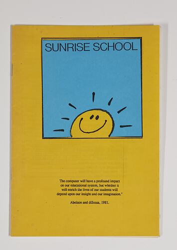 Yellow booklet cover with blue square featuring yellow smiling 'sunshine' face. Black printed text above/below