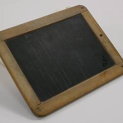 Slate board with wooden frame.