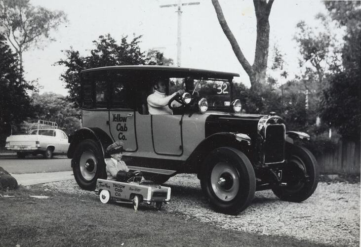 Digital Photograph - Man in Restored Vintage Car & Boy in Newly Painted Pedal Car, Briar Hill, 1972
