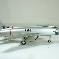 Silver aeroplane model.