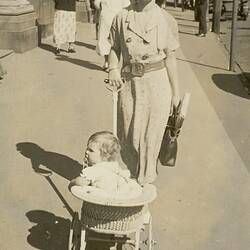 Woman Pushing Baby in Pram & Carrying Shopping, Collingwood, early 1930s