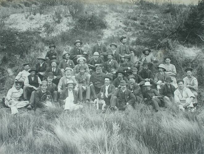 Expedition Group with Capt Anderson, some of the crew of Government steamer 'Lady Loch' & islanders and two dogs.
