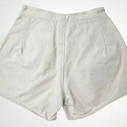 Pair of white shorts.
