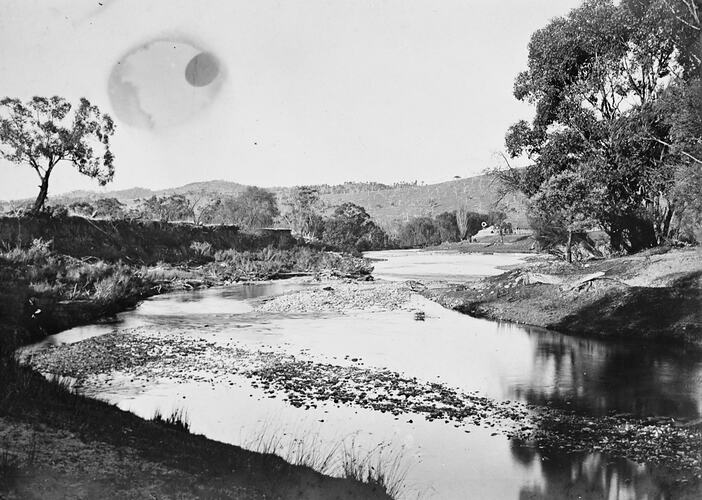 Landscape view of a wide shallow river.