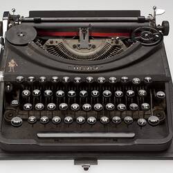 Small black typewriter.