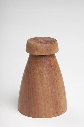 Conical wooden chess piece