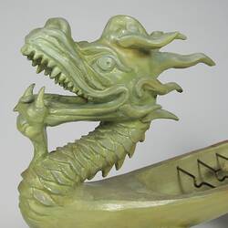 Green stone dragon, detail view of head.