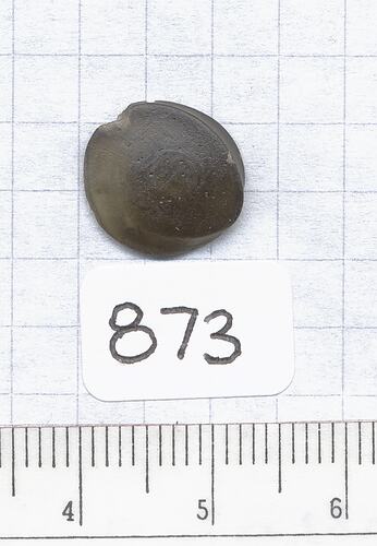 Disk-shaped tektite.