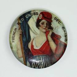 Badge with woman wearing red holding flag.