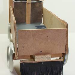 Toy truck made with found materials, back view.