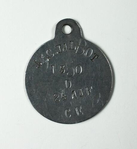 Round metal tag, reading "J. C. Talbot 1350 D 24 AIF CE".