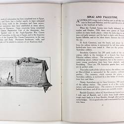 Open book page with printed text and illustration of man suspended on a wooden cross next to plaque.