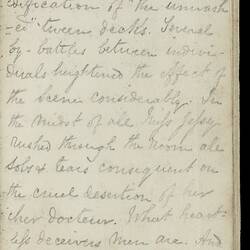 Open diary with handwritten text on discoloured worn page.