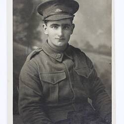 Soldier in uniform, head and shoulders.