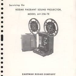 Cover page with text and photograph of projector.