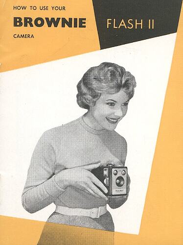Cover page with photograph of woman using camera.