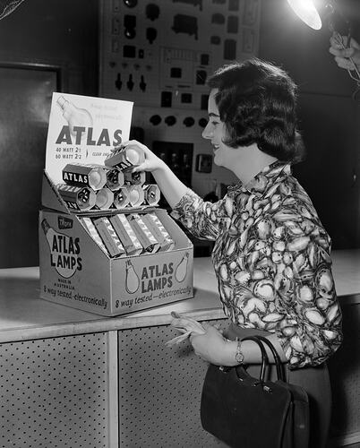 Woman with Atlas Lamps Display, Melbourne, Victoria, Nov 1958