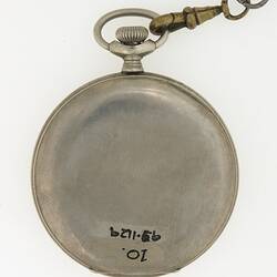 Back of silver metal round fob watch with metal cover and chain.
