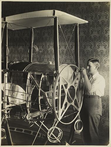 Basil Watson Fitting the Engine Mounting Frame to his Partially Constructed Biplane in the Family Home, Elsternwick, Victoria, 1916