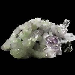 Tall purple crystal with smaller blocky green crystals.