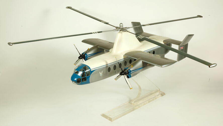 White, grey and blue helicopter model on clear stand.