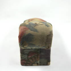Toy chaise longue, side.
