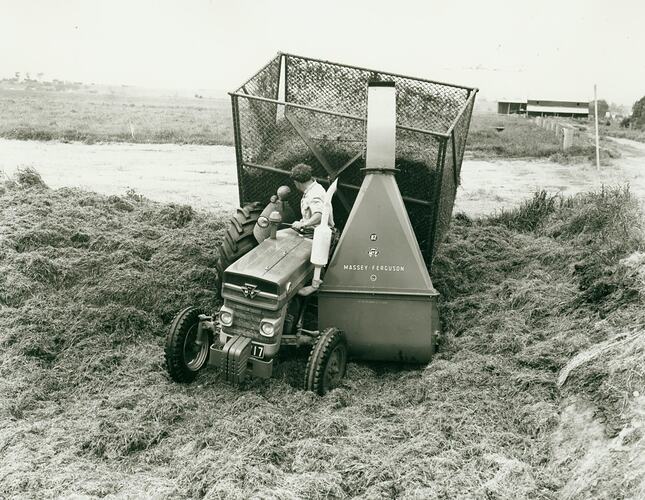 Man driving a tractor coupled to a Forage Harvester,