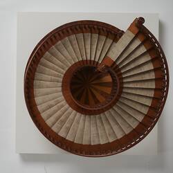 Model of a spiral wooden staircase. Top view.