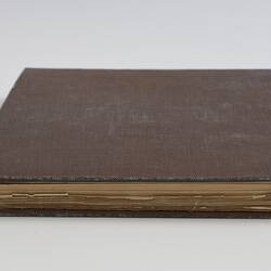Brown cloth bound book.