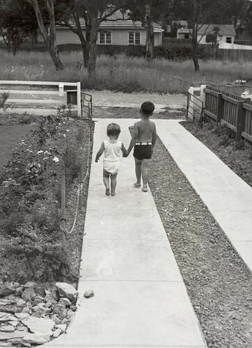 Digital Photograph - Boy Takes Sister for Walk Down Driveway of Home, Blackburn, 1953