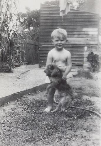 Digital Photograph - Boy Washing Dog with Garden Hose, Backyard, circa 1937