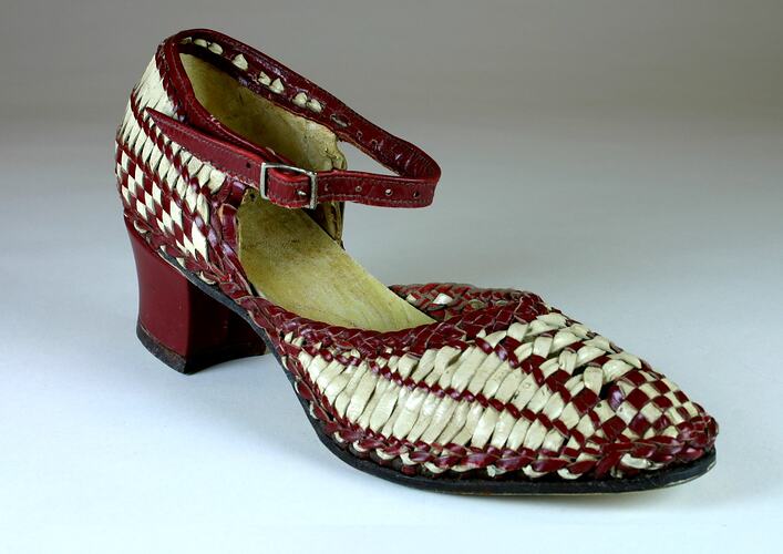 Women's maroon and cream basketweave leather high heels.