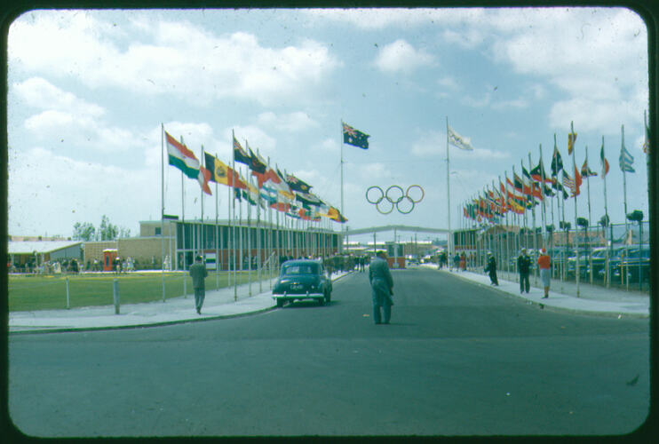 Rows of flags leading to Olympic village entrance.