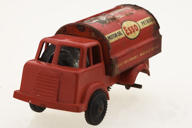 Red toy 'motor oil' truck, front view.