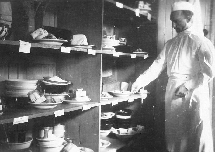 Cook with Rations in Kitchen, Displaced Persons Camp, Germany, 1946