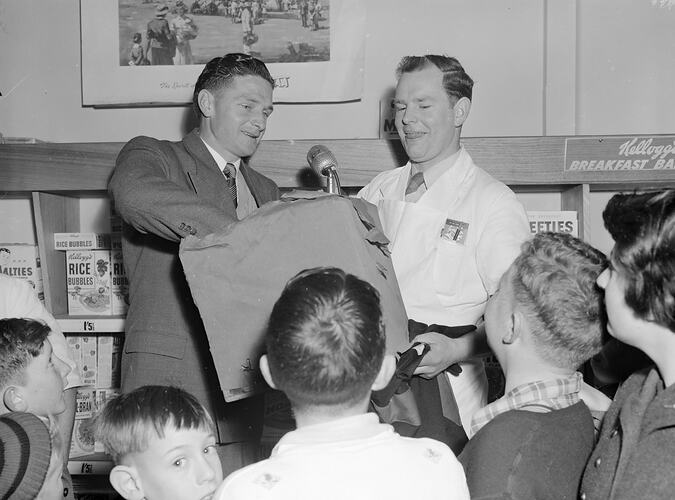 Two Male Presenters in Supermarket, Essendon, Victoria, Aug 1954