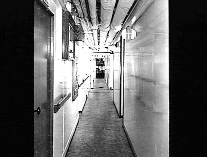 Interior corridor view of ship.