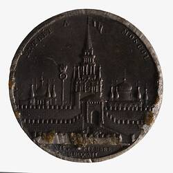 Medal with view of the fortifications and gateway of a city.