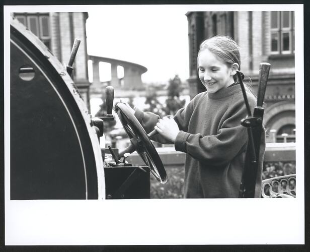 Photograph - Scienceworks, Girl Turning a Wheel, Spotswood, Victoria, circa 1991