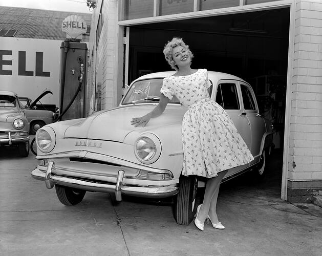Century Service Station, Woman Posed with Car, Richmond, Victoria, 06 Mar 1959